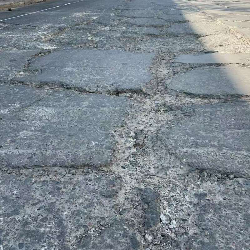 栖霞路面起砂露石子修补料
